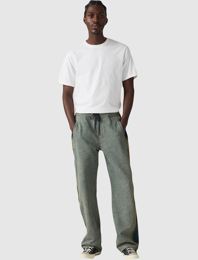 DENIM TEARS TRACK PANTS